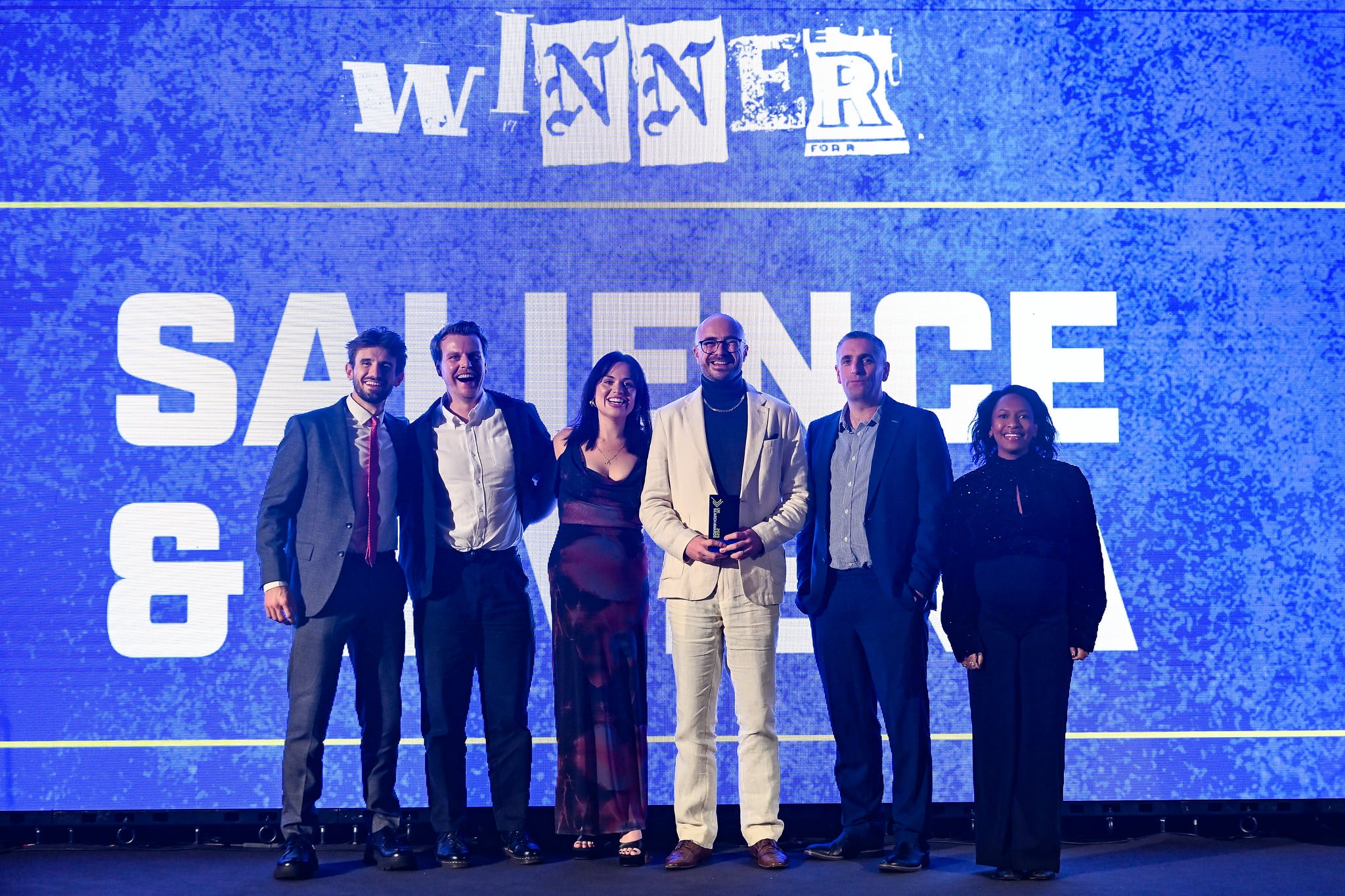 The Salience team on stage collecting a UK Search Award in 2025
